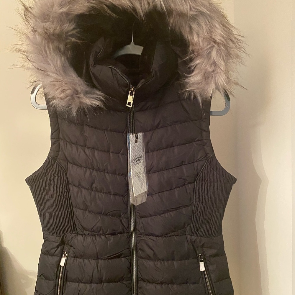 Black fur lined quilted and hooded vest
